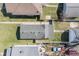 Aerial view showcases the roof, backyard, and surrounding neighborhood properties at 1135 E Southern Ave, Indianapolis, IN 46203