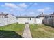 A fenced backyard features a small patch of grass at 1135 E Southern Ave, Indianapolis, IN 46203