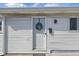 Inviting front door adorned with a wreath and a stylish black mailbox at 1135 E Southern Ave, Indianapolis, IN 46203