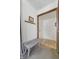 Welcoming entryway with a bench and coat rack, leading into the home at 1135 E Southern Ave, Indianapolis, IN 46203