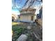 A view of the home's exterior showcasing the backyard and siding at 114 E Palmer St, Indianapolis, IN 46225