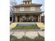 Charming home with a cozy front porch, perfect for relaxing outdoors at 114 E Palmer St, Indianapolis, IN 46225