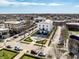 Aerial view of a charming town square with manicured gardens at 12895 Grenville St, Carmel, IN 46032