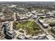 Aerial view of a lively town square with shops, restaurants, and green spaces at 12895 Grenville St, Carmel, IN 46032