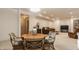 Spacious finished basement with a dining table, comfortable seating, and neutral carpet at 12895 Grenville St, Carmel, IN 46032