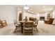 Basement featuring carpet, a dining table, and sofa with comfortable seating at 12895 Grenville St, Carmel, IN 46032