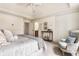 Bedroom featuring carpet, vaulted ceilings, and access to the en-suite bathroom at 12895 Grenville St, Carmel, IN 46032