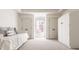 Bright bedroom with ample closet space, white carpet, and a twin day bed at 12895 Grenville St, Carmel, IN 46032