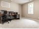 Office featuring carpet, a desk with computer equipment, and natural light from a window at 12895 Grenville St, Carmel, IN 46032