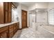 Bathroom featuring double sinks, granite countertop, glass enclosed shower, and soaking tub at 1326 White Water Ct, Cicero, IN 46034