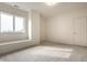 Bright bedroom with large window and window seat, carpeted floors, and neutral paint at 1326 White Water Ct, Cicero, IN 46034
