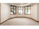 Bright bonus room with recessed lighting, carpeted floor, and view of the lake at 1326 White Water Ct, Cicero, IN 46034