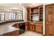 Finished basement with wet bar, sink, dishwasher and lake views at 1326 White Water Ct, Cicero, IN 46034