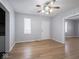 Comfortable living room featuring hardwood floors and neutral walls at 1327 E Minnesota St, Indianapolis, IN 46203