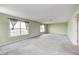 Spacious bedroom with ample natural light, neutral tones, and plush carpeting for a comfortable retreat at 1502 W 525 N, Lebanon, IN 46052