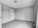 Simple bedroom features neutral walls, carpet, and trim at 1502 W 525 N, Lebanon, IN 46052