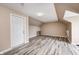 Bonus room featuring wood-look floors, neutral walls and a door to the exterior at 1502 W 525 N, Lebanon, IN 46052