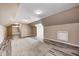 Large bonus room featuring wood-look flooring, textured ceiling and ample space at 1502 W 525 N, Lebanon, IN 46052