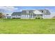 Charming two-story home with a covered front porch and a well-maintained lawn on a sunny day at 1502 W 525 N, Lebanon, IN 46052