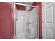 Modern walk-in shower with glass doors, providing a sleek and functional addition to the bathroom at 1502 W 525 N, Lebanon, IN 46052
