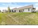 Expansive backyard featuring a large grassy area and mature trees, perfect for outdoor activities and relaxation at 17865 Haralson Row, Westfield, IN 46074