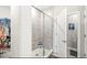 Modern bathroom with glass enclosed shower and closet for storage at 17865 Haralson Row, Westfield, IN 46074