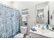 Nautical themed bathroom with charming decor and a bright white vanity at 17865 Haralson Row, Westfield, IN 46074