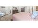 Comfortable bedroom with soft lighting, natural colored carpet and wood furniture at 17865 Haralson Row, Westfield, IN 46074