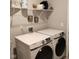 Well-equipped laundry room with new front loading Samsung washer and dryer at 17865 Haralson Row, Westfield, IN 46074