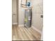 A utility room with a new water heater and laminate flooring at 17865 Haralson Row, Westfield, IN 46074