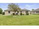 Expansive backyard of the brick home, perfect for outdoor activities and relaxation at 1864 Holiday Pines Dr, Brownsburg, IN 46112
