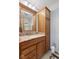 Bathroom with wood vanity and drawers and a shower with glass door at 1864 Holiday Pines Dr, Brownsburg, IN 46112
