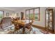 Formal dining room featuring classic decor and large windows at 1864 Holiday Pines Dr, Brownsburg, IN 46112