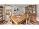 Traditional dining room with wood table, chairs and a built-in china cabinet at 1864 Holiday Pines Dr, Brownsburg, IN 46112