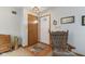 Inviting entryway featuring light walls, wood flooring, and traditional decor at 1864 Holiday Pines Dr, Brownsburg, IN 46112
