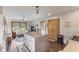 Open-concept kitchen featuring an island, wood flooring, and modern fixtures at 1864 Holiday Pines Dr, Brownsburg, IN 46112