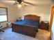 Cozy main bedroom featuring a large window and a ceiling fan at 1864 Holiday Pines Dr, Brownsburg, IN 46112