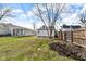 A lovely fenced backyard with lawn providing a nice outdoor space at 1924 S A St, Elwood, IN 46036