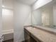 Comfortable bathroom features a single sink vanity, hard surface counters, and a tub with a shower at 1924 White Oak Ln, Shelbyville, IN 46176
