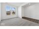 Bright bedroom with two windows, carpeted floor, and white walls at 1924 White Oak Ln, Shelbyville, IN 46176