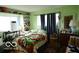 Bright bedroom with natural light and hardwood floors at 1936 Cunningham Rd, Indianapolis, IN 46224