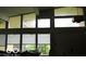 Living room with large windows, blinds, and string lights decoration at 1936 Cunningham Rd, Indianapolis, IN 46224