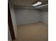Finished basement with neutral carpet and clean, bright walls. Storage potential! at 1936 Cunningham Rd, Indianapolis, IN 46224