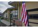 Ranch home featuring a large front yard, big windows, and American flag at 1936 Cunningham Rd, Indianapolis, IN 46224