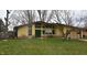 Charming single-story home with a lush front lawn and welcoming curb appeal at 1936 Cunningham Rd, Indianapolis, IN 46224