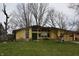 Charming single-story home with a lush front lawn and welcoming curb appeal at 1936 Cunningham Rd, Indianapolis, IN 46224