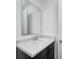 Bathroom vanity featuring dark cabinets and white countertop at 1952 White Oak Ln, Shelbyville, IN 46176