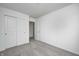 Neutral bedroom featuring carpet, closet with sliding doors, and white walls at 1952 White Oak Ln, Shelbyville, IN 46176