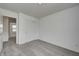 Neutral bedroom featuring carpet, closet with sliding doors, and white walls at 1952 White Oak Ln, Shelbyville, IN 46176