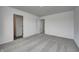 Cozy bedroom featuring neutral carpet and a view of a bathroom at 1952 White Oak Ln, Shelbyville, IN 46176